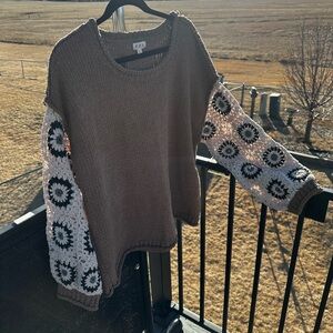 POL Brown Sweater, Cream Crochet Sleeves, dark blue squares, lighter center